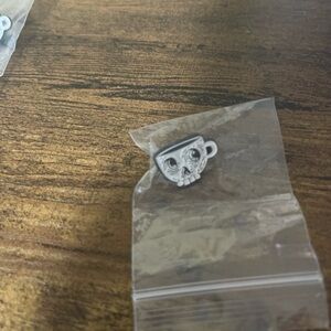 White skull coffee cup pin
